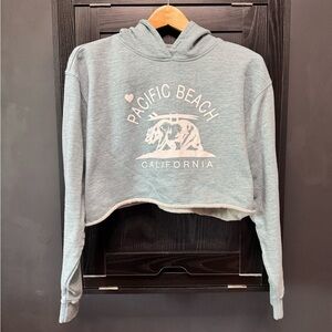 Reflex light blue/teal cropped distressed hoodie